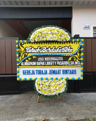Papan Bunga Duka di Naku